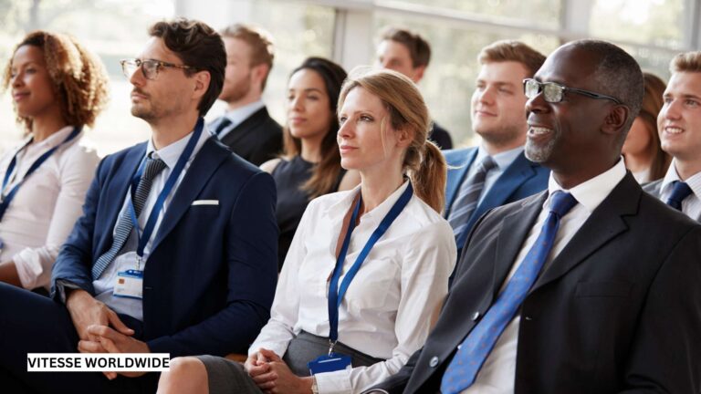 Diverse group attending business conference